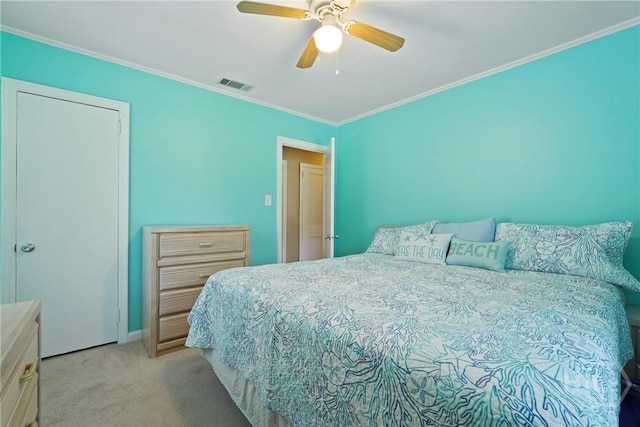 3010 Leonard St, Savannah, GA 31404 - bedroom with crown molding, light carpet, a ceiling fan, and baseboards