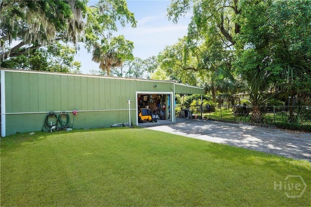 3010 Leonard St, Savannah, GA 31404 - view of outdoor structure with concrete driveway and an outbuilding