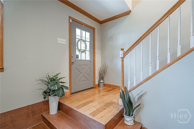116 Deerfield Dr, Springfield, GA 31329 - entrance foyer with stairway, ornamental molding, and wood finished floors