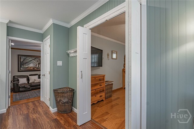 116 Deerfield Dr, Springfield, GA 31329 - hallway with dark wood-type flooring, ornamental molding, and baseboards