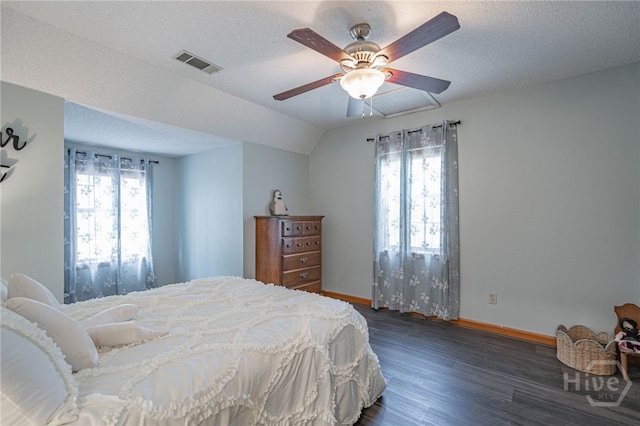 116 Deerfield Dr, Springfield, GA 31329 - bedroom with dark wood finished floors, baseboards, a ceiling fan, and a textured ceiling