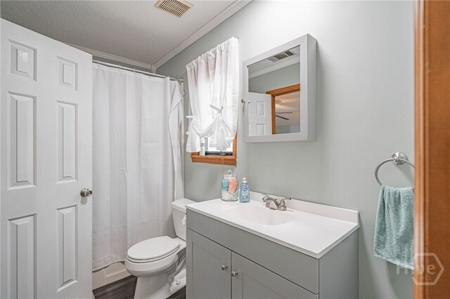 116 Deerfield Dr, Springfield, GA 31329 - bathroom featuring toilet, vanity, crown molding, wood finished floors, and curtained shower