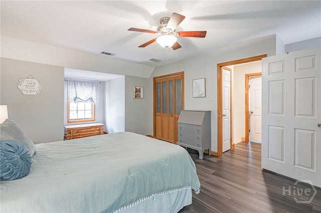 116 Deerfield Dr, Springfield, GA 31329 - bedroom with dark wood-style flooring, a closet, ceiling fan, and baseboards