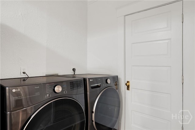 117 Lincoln St Unit 4A, Savannah, GA 31401 - laundry area featuring washing machine and clothes dryer
