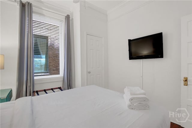 117 Lincoln St Unit 4A, Savannah, GA 31401 - bedroom featuring crown molding