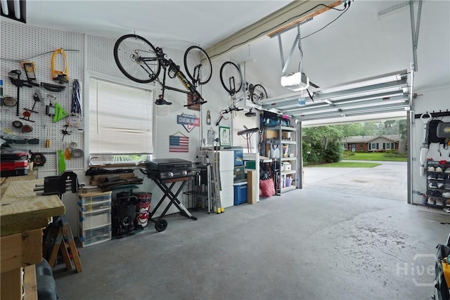 622 Northbrook Rd, Savannah, GA 31419 - garage featuring a workshop area and a garage door opener