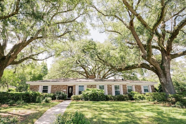 1 Broadmoor Cir, Savannah, GA 31406 - ranch-style house with brick siding, a chimney, and a front yard
