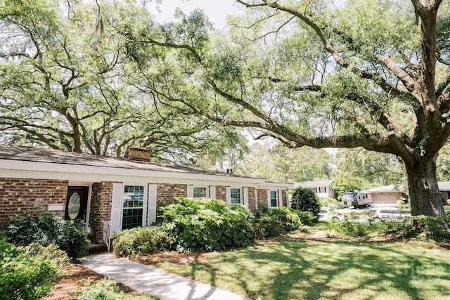 1 Broadmoor Cir, Savannah, GA 31406 - view of front of property featuring a chimney and brick siding