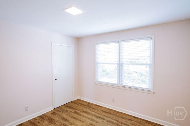1 Broadmoor Cir, Savannah, GA 31406 - empty room featuring light wood-type flooring and baseboards
