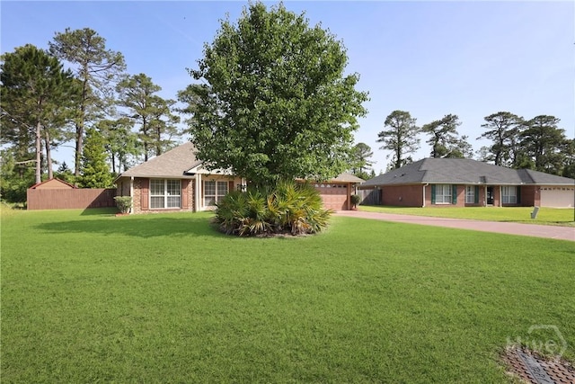 1919 Bluestone Loop, Hinesville, GA 31313 - ranch-style home with driveway and brick siding