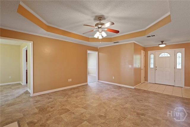 1919 Bluestone Loop, Hinesville, GA 31313 - foyer entrance with a raised ceiling, ornamental molding, a ceiling fan, a textured ceiling, and baseboards
