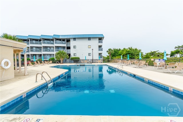 1217 Bay St Unit 107B, Tybee Island, GA 31328 - community pool with a patio area