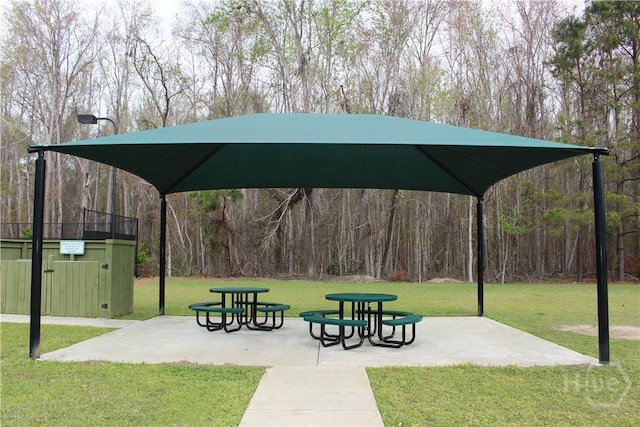 135 Como Dr, Pooler, GA 31322 - view of community featuring a yard and a patio