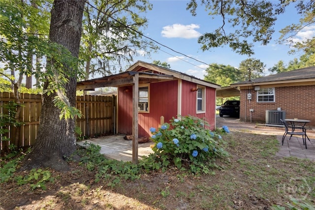 1613 Rosewood Dr, Savannah, GA 31406 - view of outbuilding with fence, an outbuilding, and central air condition unit