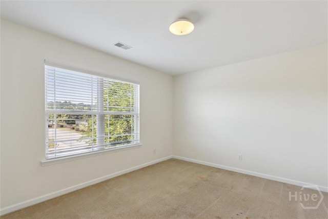 133 Spring Lakes Dr, Savannah, GA 31407 - spare room featuring baseboards and light colored carpet