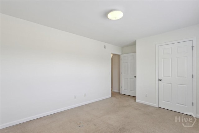 133 Spring Lakes Dr, Savannah, GA 31407 - unfurnished bedroom with baseboards and light carpet