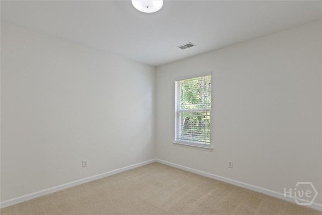 133 Spring Lakes Dr, Savannah, GA 31407 - unfurnished room with baseboards and light colored carpet