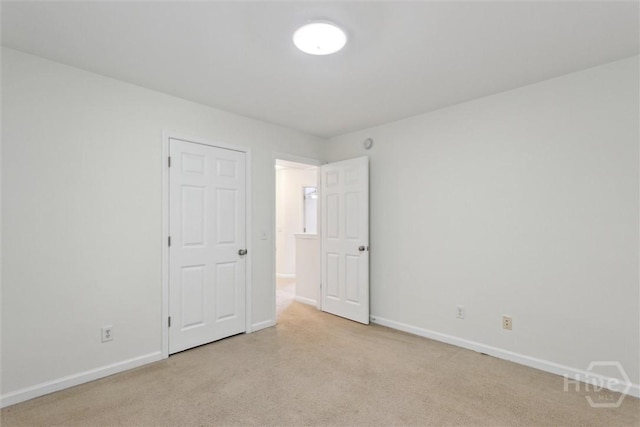 133 Spring Lakes Dr, Savannah, GA 31407 - unfurnished bedroom with light colored carpet and baseboards