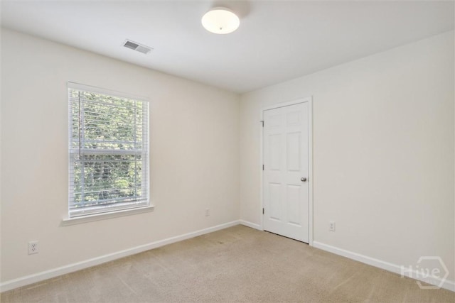 133 Spring Lakes Dr, Savannah, GA 31407 - spare room featuring light carpet and baseboards