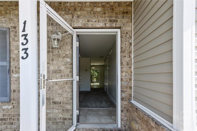 133 Spring Lakes Dr, Savannah, GA 31407 - view of exterior entry featuring brick siding