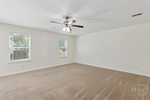 133 Spring Lakes Dr, Savannah, GA 31407 - spare room with healthy amount of natural light, light carpet, baseboards, and a ceiling fan