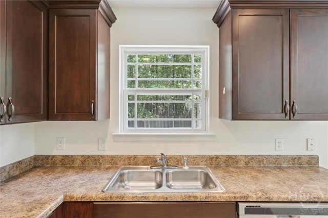 133 Spring Lakes Dr, Savannah, GA 31407 - kitchen featuring a sink, dark brown cabinetry, dishwashing machine, and light countertops