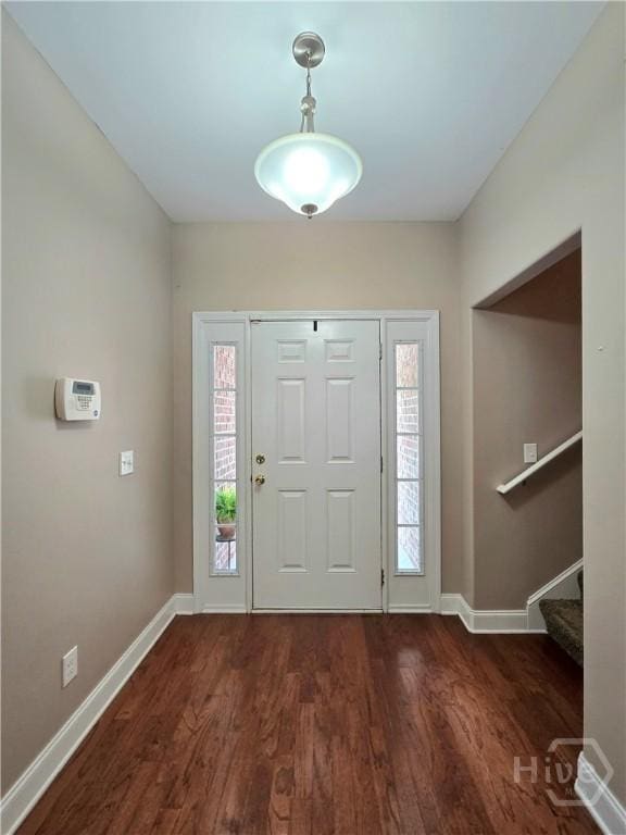 6 Sagefield Dr, Ellabell, GA 31308 - foyer featuring baseboards, wood finished floors, and stairs