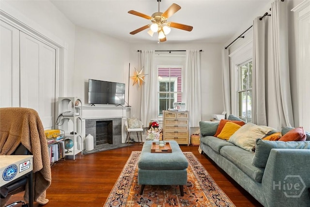 1722/1724 Barnard St, Savannah, GA 31401 - living room with wood finished floors, ceiling fan, and a fireplace with flush hearth