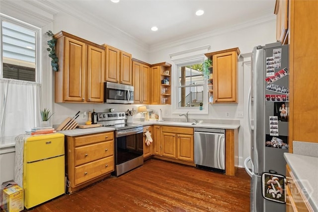 1722/1724 Barnard St, Savannah, GA 31401 - kitchen with stainless steel appliances, dark wood-style floors, light countertops, ornamental molding, and recessed lighting