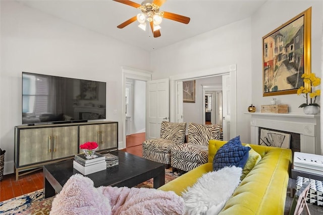 1722/1724 Barnard St, Savannah, GA 31401 - living area featuring a fireplace, a ceiling fan, and wood finished floors