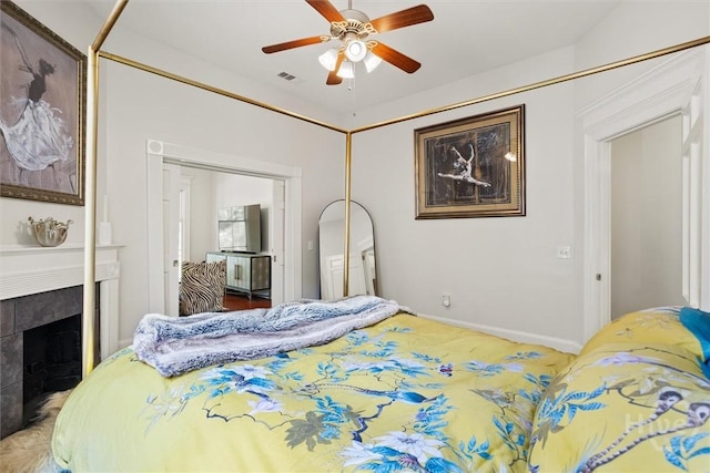 1722/1724 Barnard St, Savannah, GA 31401 - bedroom featuring a fireplace and a ceiling fan