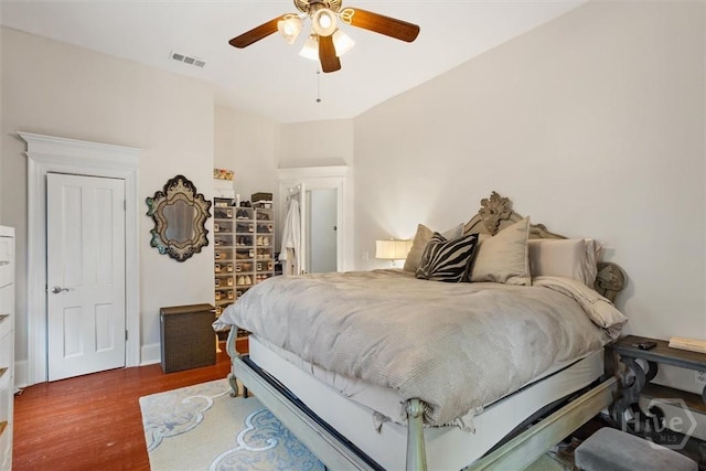 1722/1724 Barnard St, Savannah, GA 31401 - bedroom with wood finished floors, a ceiling fan, and baseboards