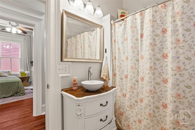 1722/1724 Barnard St, Savannah, GA 31401 - full bath with wood finished floors, vanity, ceiling fan, and curtained shower