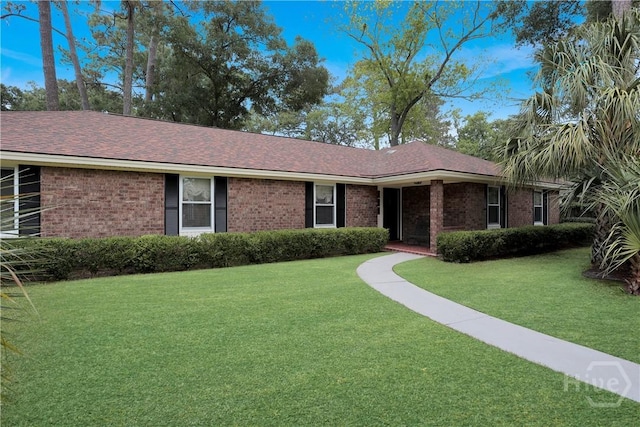 1 Black Forest Dr, Savannah, GA 31410 - ranch-style home featuring a front lawn, brick siding, and roof with shingles