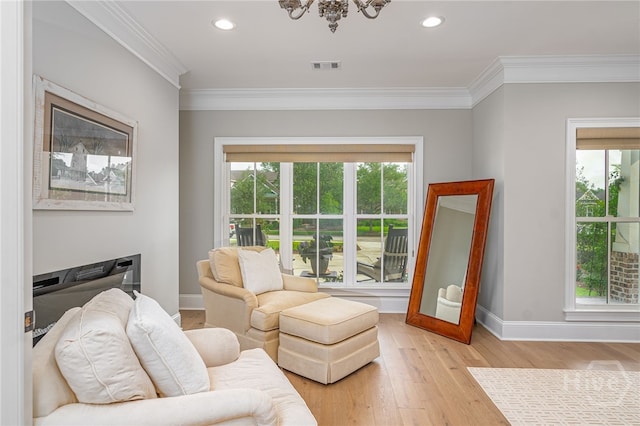 124 Kent Trl, Pooler, GA 31322 - living room featuring baseboards, plenty of natural light, crown molding, light wood-style flooring, and recessed lighting