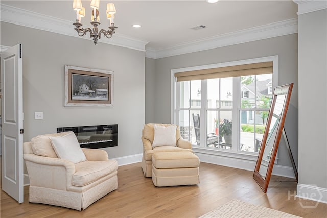 124 Kent Trl, Pooler, GA 31322 - sitting room with light wood-type flooring, crown molding, a chandelier, baseboards, and recessed lighting