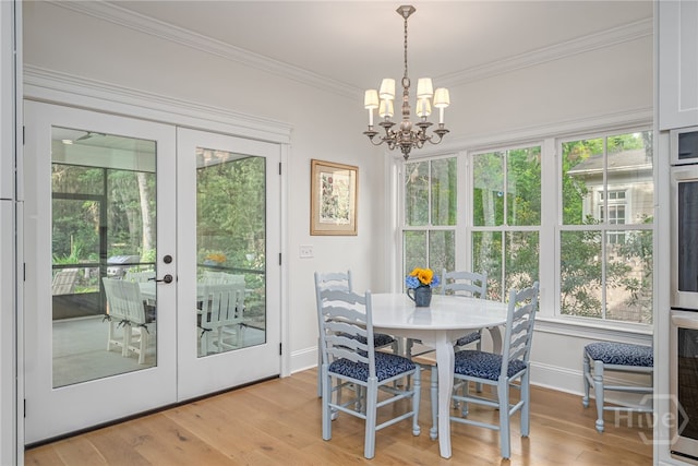 124 Kent Trl, Pooler, GA 31322 - dining room featuring french doors, a chandelier, ornamental molding, baseboards, and healthy amount of natural light