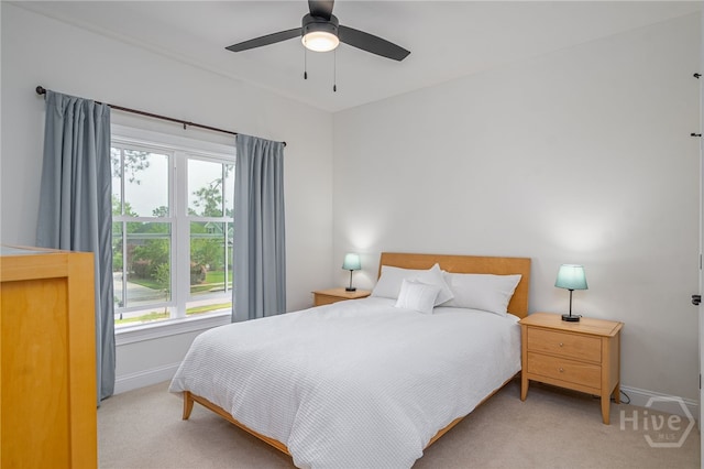 124 Kent Trl, Pooler, GA 31322 - carpeted bedroom featuring baseboards, multiple windows, and a ceiling fan