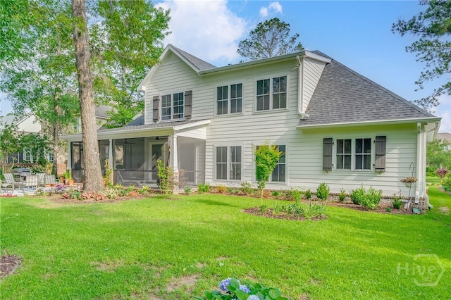 124 Kent Trl, Pooler, GA 31322 - back of property with a shingled roof, a sunroom, and a yard