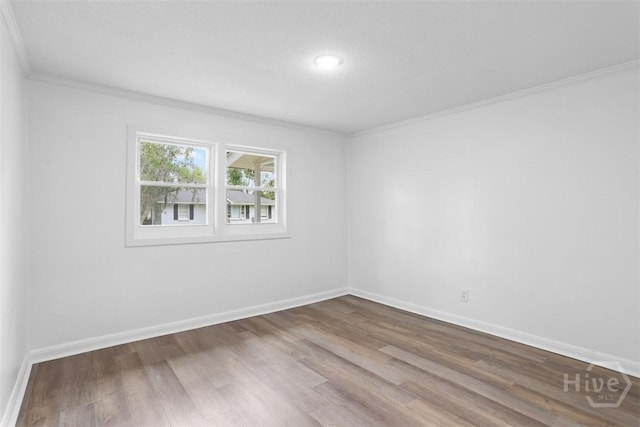 72 Bazemore Ave, Savannah, GA 31408 - spare room with wood finished floors, ornamental molding, baseboards, and recessed lighting