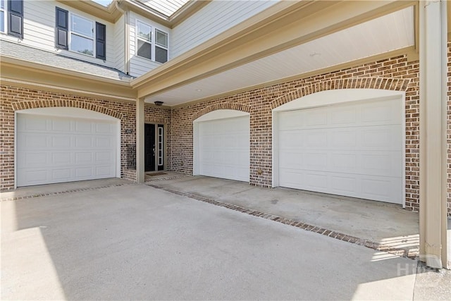 204 River Oaks Dr, Richmond Hill, GA 31324 - garage featuring driveway