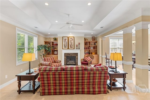 204 River Oaks Dr, Richmond Hill, GA 31324 - living room featuring carpet floors, a glass covered fireplace, a ceiling fan, recessed lighting, and crown molding