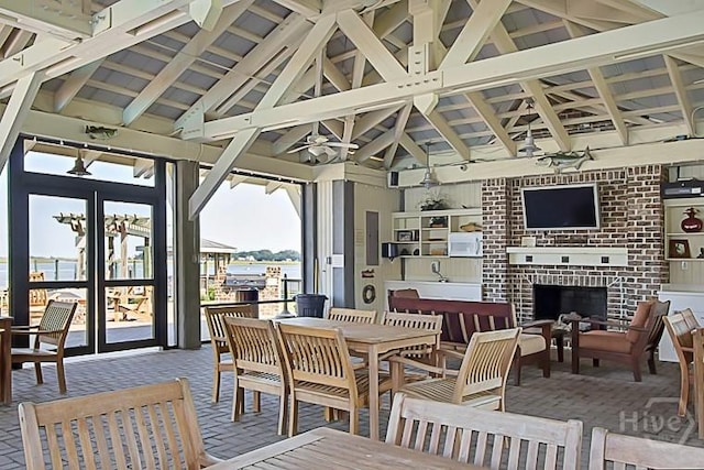 204 River Oaks Dr, Richmond Hill, GA 31324 - view of patio / terrace featuring a gazebo, an outdoor living space with a fireplace, ceiling fan, and outdoor dining space