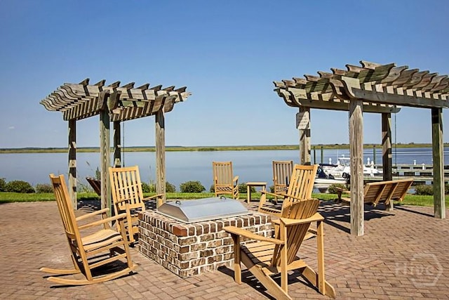 204 River Oaks Dr, Richmond Hill, GA 31324 - view of patio with a pergola and a water view