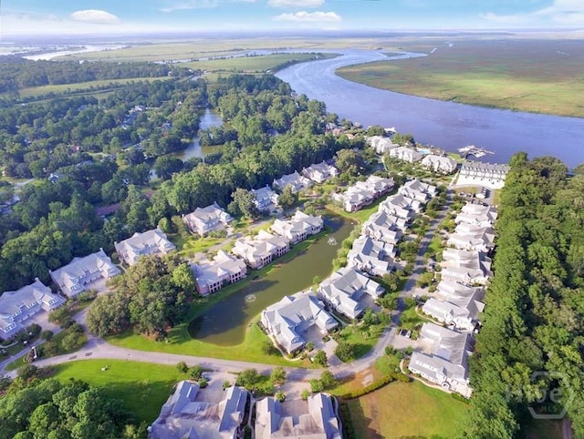 204 River Oaks Dr, Richmond Hill, GA 31324 - aerial view of property's location with a large body of water and nearby suburban area