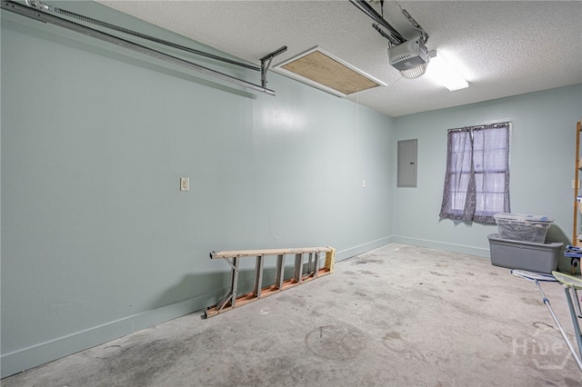145 New Stillwell Rd, Springfield, GA 31329 - garage with a garage door opener, electric panel, and baseboards