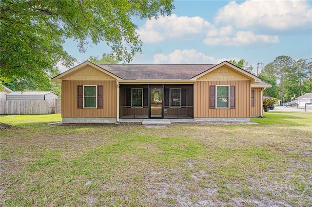 145 New Stillwell Rd, Springfield, GA 31329 - view of front of house with a sunroom and roof with shingles