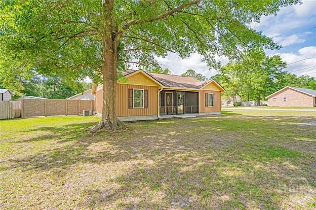 145 New Stillwell Rd, Springfield, GA 31329 - rear view of property featuring cooling unit, a sunroom, and board and batten siding