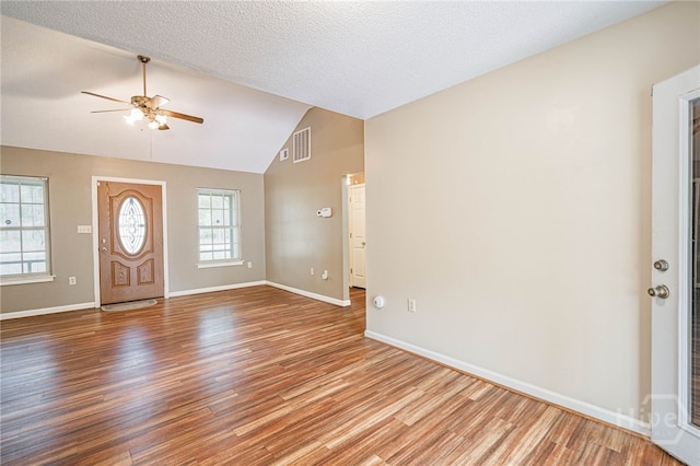 145 New Stillwell Rd, Springfield, GA 31329 - foyer entrance with a ceiling fan, wood finished floors, lofted ceiling, and baseboards