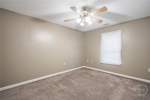 145 New Stillwell Rd, Springfield, GA 31329 - carpeted spare room featuring a ceiling fan, baseboards, and a textured ceiling